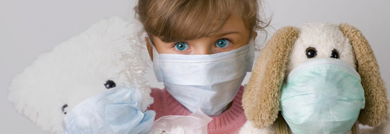 Little Girl and Stuffed Animals Wearing Air Quality Mask